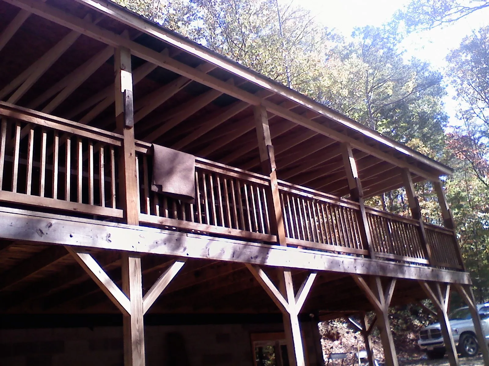 Timber framing under a new elevated porch and deck — Roof Leak Repair in Grand Terrace by Roofing Brothers