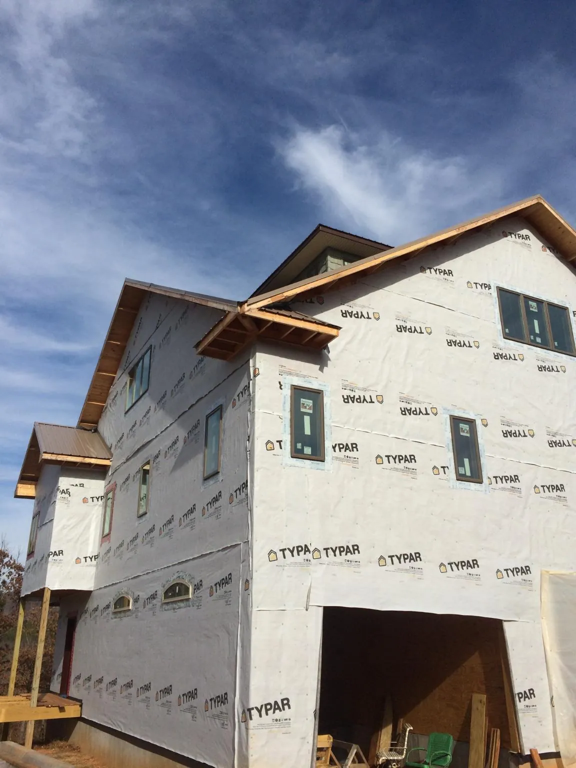 Stick built house wrapped in Typar with new roof framing and dormers in Grand Terrace